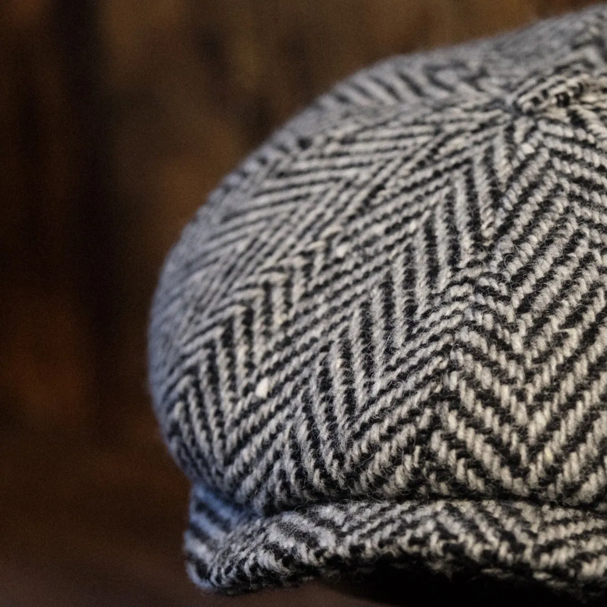 Eight Piece White & Black Herringbone Wool Newsboy Cap