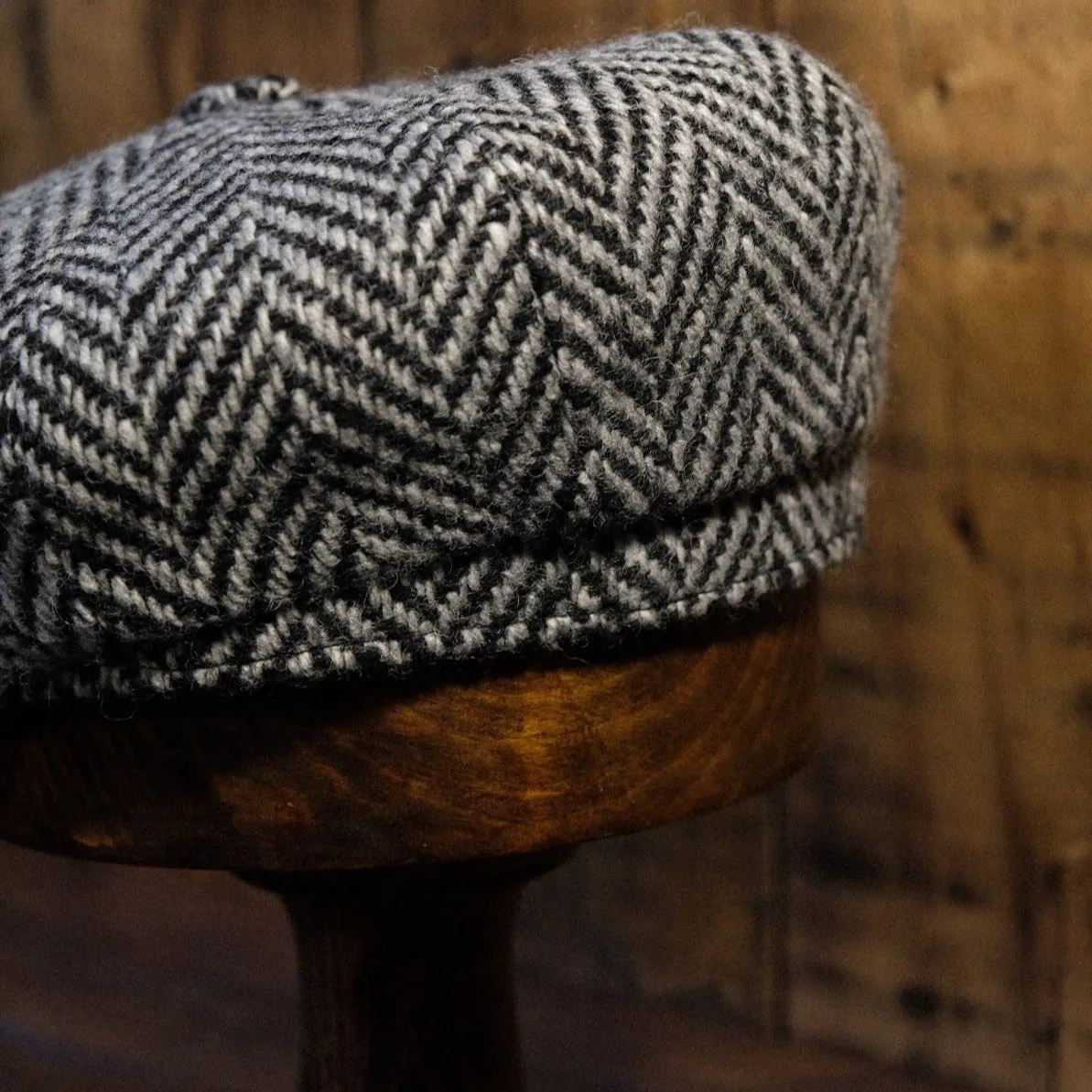 Eight Piece White & Black Herringbone Wool Newsboy Cap